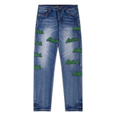 Amiri Jeans Blue Jeans Ripped Letter Embroidered Jeans